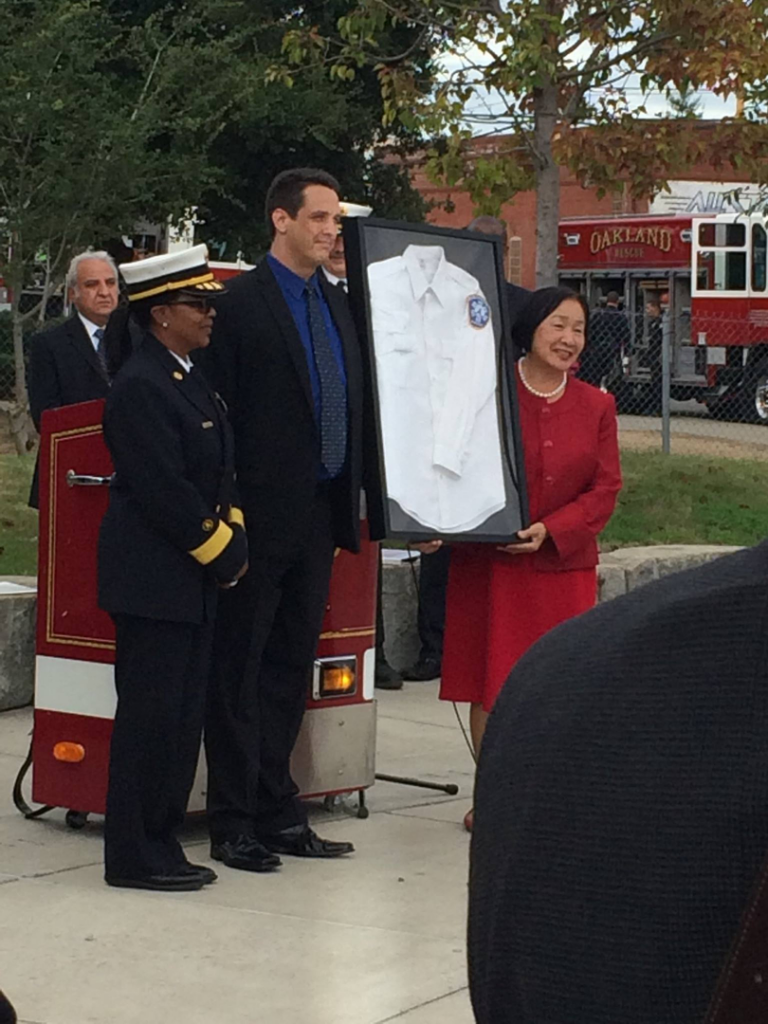 Aaron Janssen - Allied Ambulance shirt presentation to Oakland Mayor and Fire Chief @ LP25